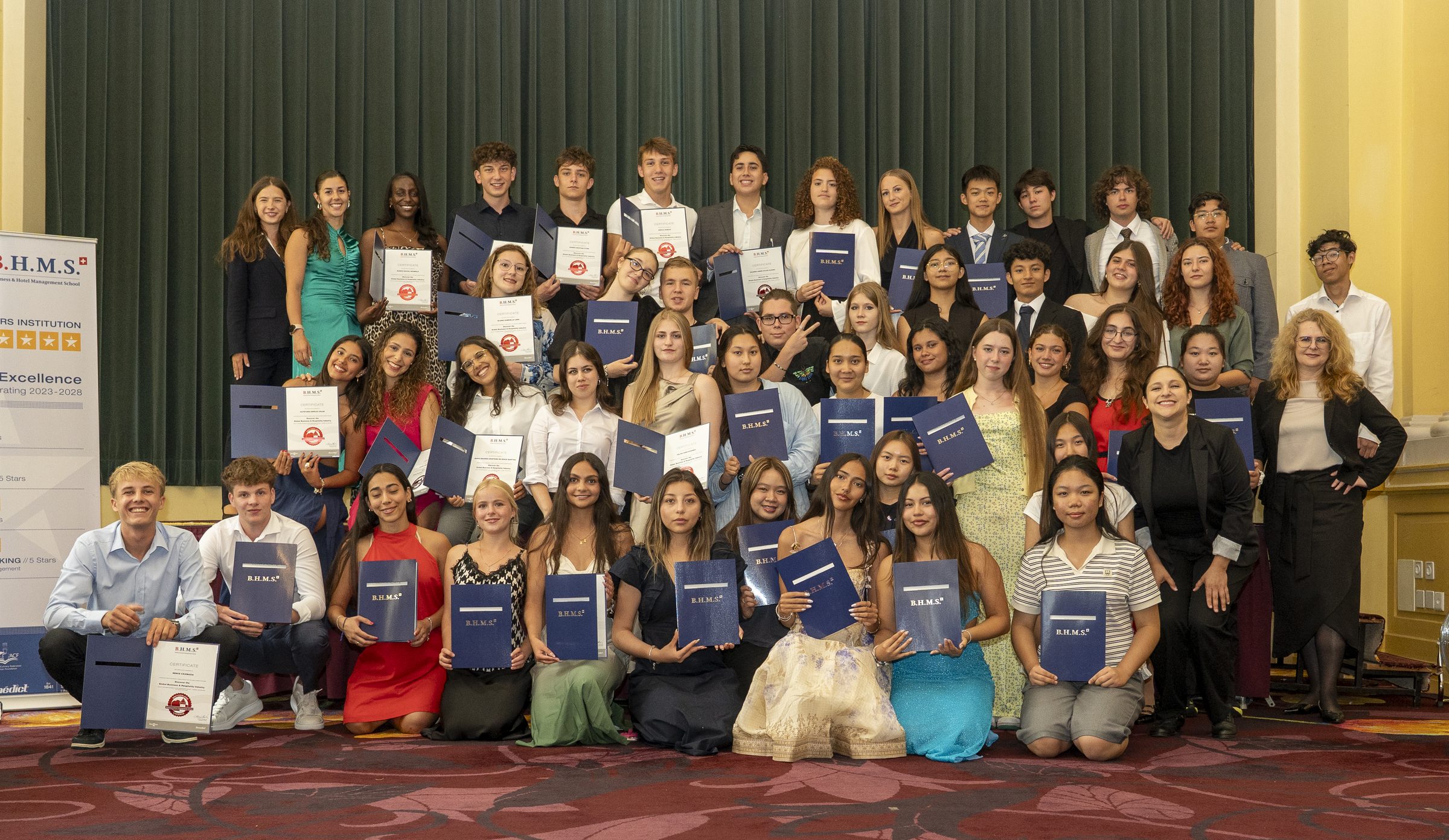 Summer campers holding their BHMS Certificates of Attendance